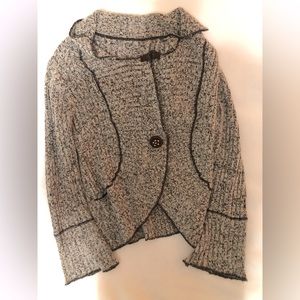 Gently worn. Pet and smoke free home. Knitted sweater.